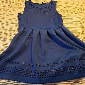NWT blue fit and flare dress with cutouts.